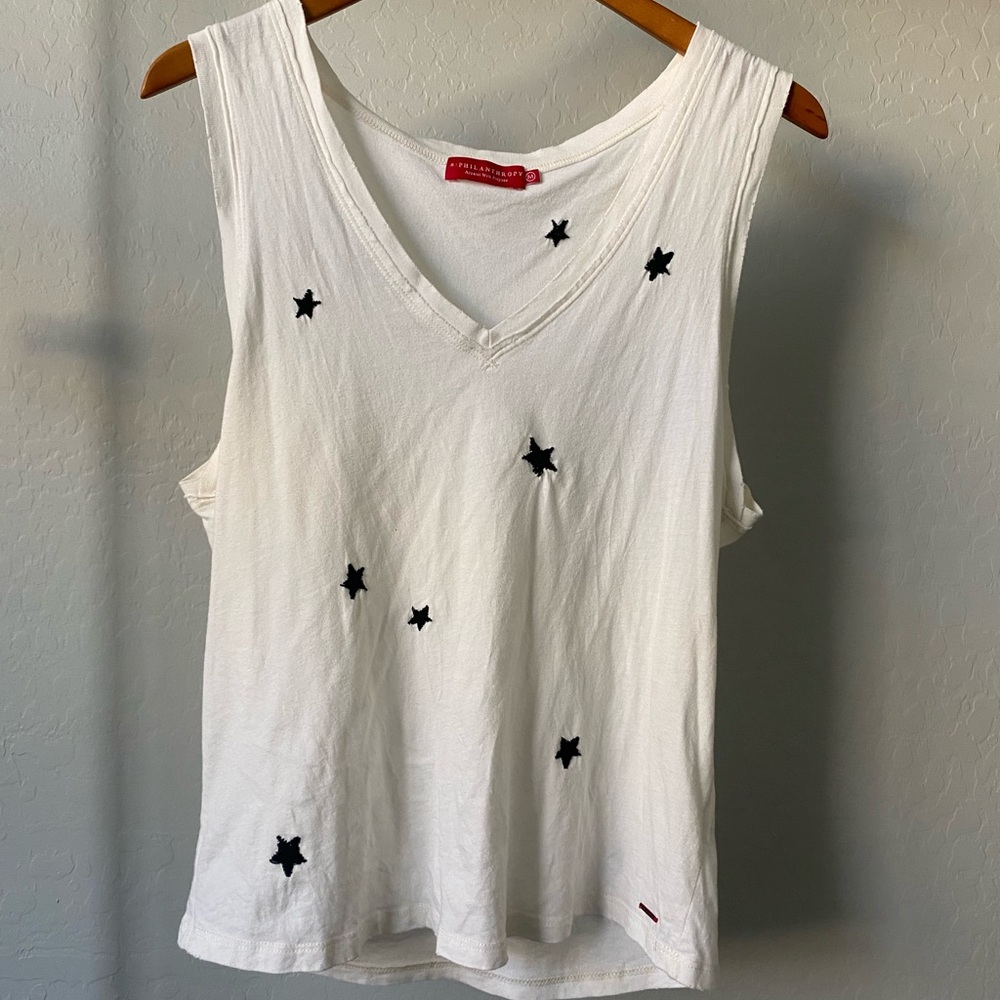 White Sleeveless Top with Black Star Accents